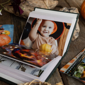 Open,Picture,Album,With,Halloween,Printed,Photos.